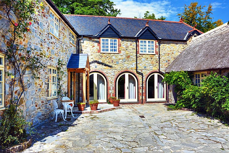 Click here for more about The Coach House